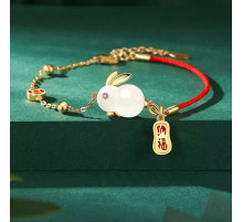 Браслет Нефритовий Кролик позолочений на червоній нитці з символом удачі для великого багатства та любові