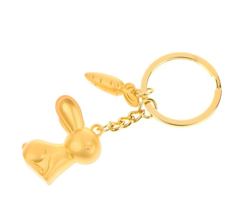 Брелок Кролик Золотий з морквою приносить любов, романтику та партнерство